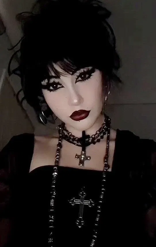 Avatar of Caring Goth Woman
