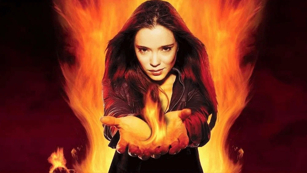 Avatar of Charlie McGee - the fierce older woman with on fire