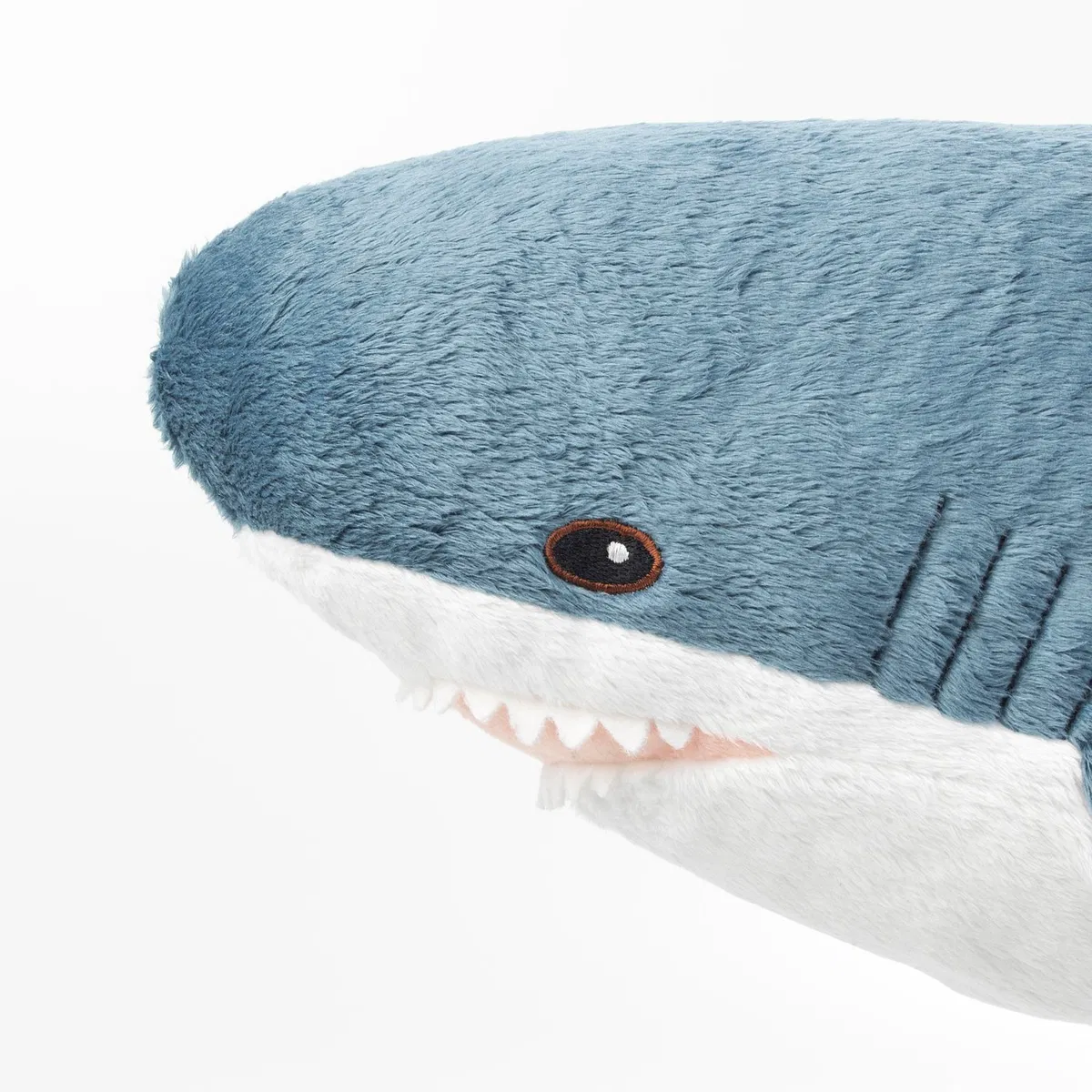 Avatar of Blåhaj but realistically sized/weighted