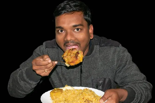 Avatar of Indian Guy Eating Chicken Curry