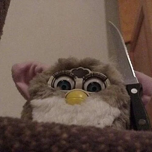 Avatar of Giggles, the Murder Furby.